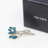 broche Prada